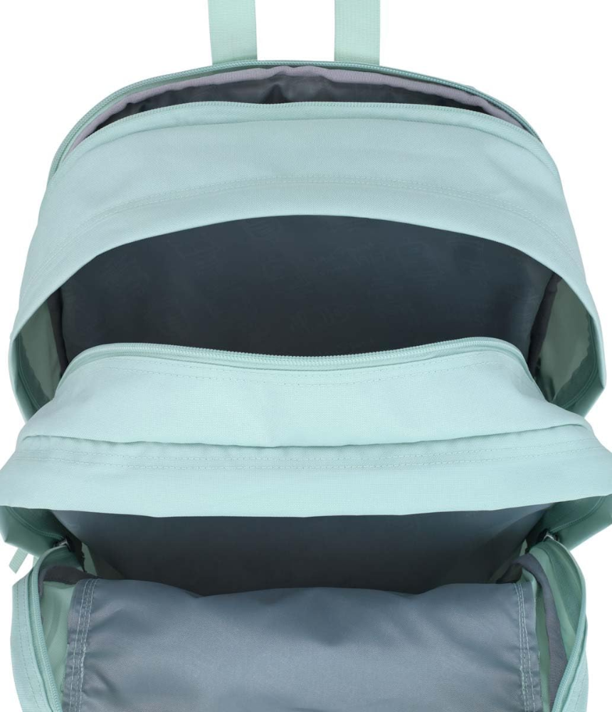 La JanSport Big Student Backpack es una mochila unisex de 34 L fabricada en poliéster resistente, con dos compartimentos principales, espacio acolchado para laptop de hasta 15?, múltiples bolsillos or - Imagen 4